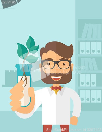 Image of Chemist with tube and eco leaves.