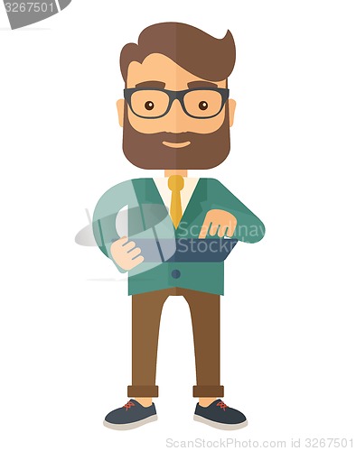 Image of Mid adult male engineer holding blueprint.