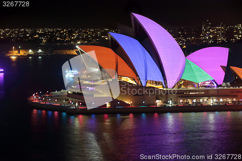 Image of Sydney Opera House sails lit in bright colours
