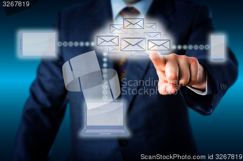 Image of Manager Touching A Host Of Emails In Cloud Network