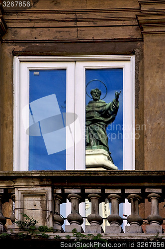 Image of a saint in the window