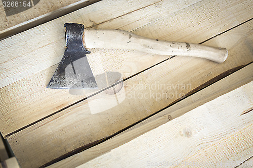 Image of Carpenter's ax with wood handle