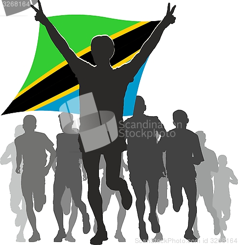 Image of Athlete with the Tanzania flag at the finish