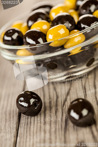 Image of Olives on a wooden table