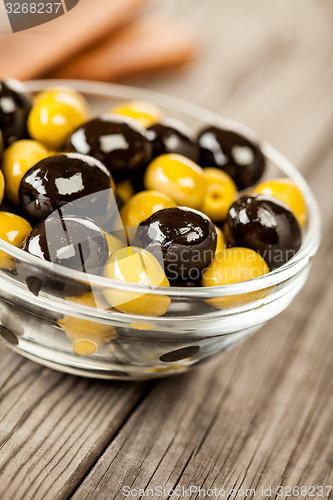 Image of Olives on a wooden table