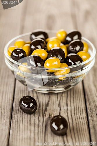 Image of Olives on a wooden table