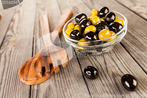 Image of Olives on a wooden table