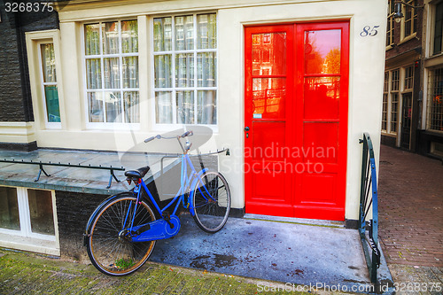 Image of Bicycle parked near a house in Amsterdam