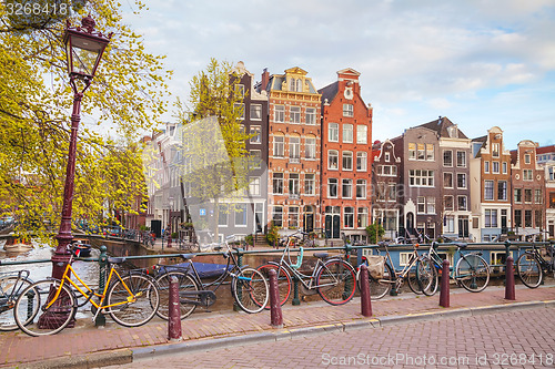 Image of Bicycles parked on a bridge in Amsterdam