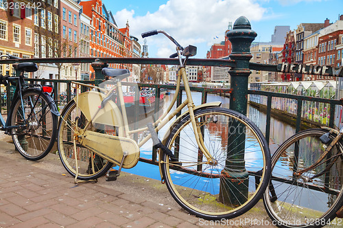 Image of Bicycles parked near the floating flower market in Amsterdam