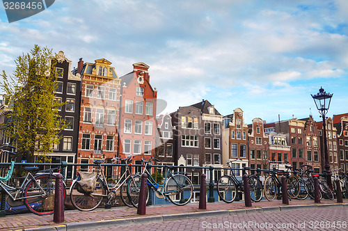 Image of Bicycles parked on a bridge in Amsterdam