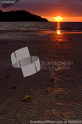 Image of little stone in the sunset\'s ocean