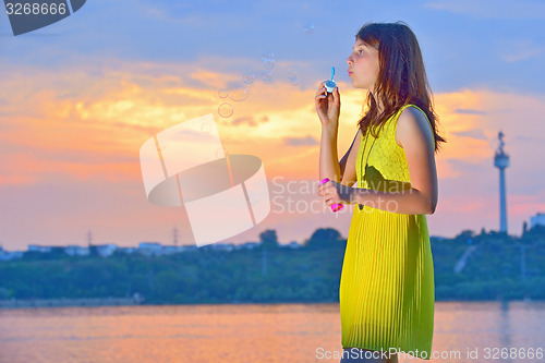 Image of girl with soap bubbles