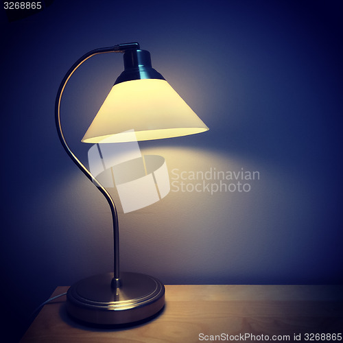 Image of Table lamp in a dark room