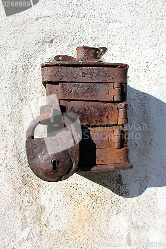 Image of Antique moneybox with padlock intended for helping poor people 