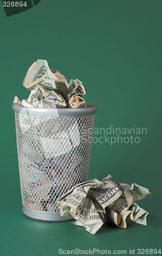 Image of Wasted money - Dollar bills