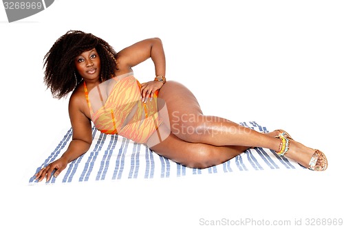 Image of African woman in bikini.