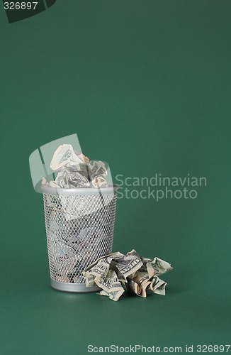 Image of Wasted money - Dollar bills