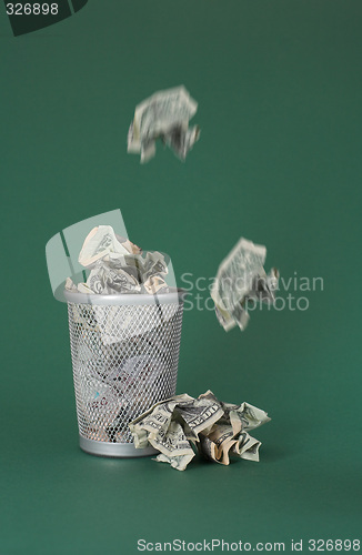 Image of Wasted money - Dollar bills