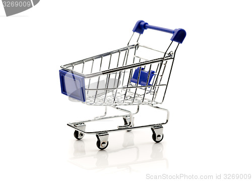 Image of Miniature empty supermarket trolley