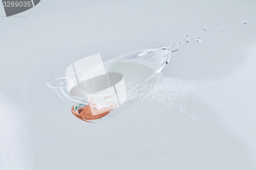 Image of One euro cent splash water drowning.