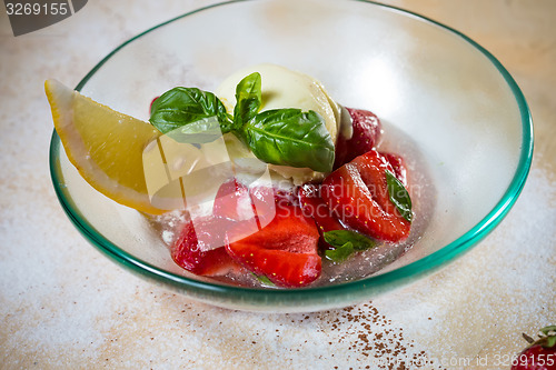 Image of Ice cream with fresh strawberries