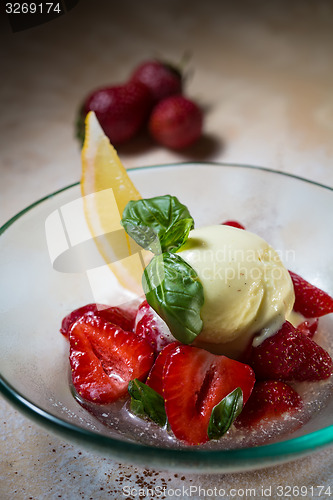 Image of Ice cream with fresh strawberries