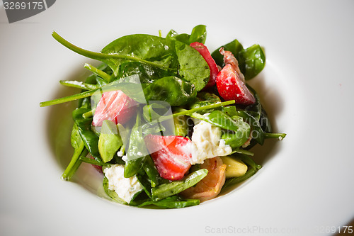 Image of Fresh Salad with strawberries, goat cheese and shrimps