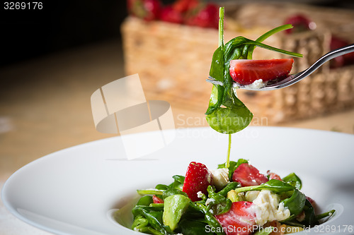 Image of Fresh Salad with strawberries, goat cheese and shrimps