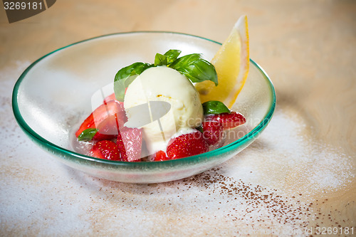 Image of Ice cream with fresh strawberries