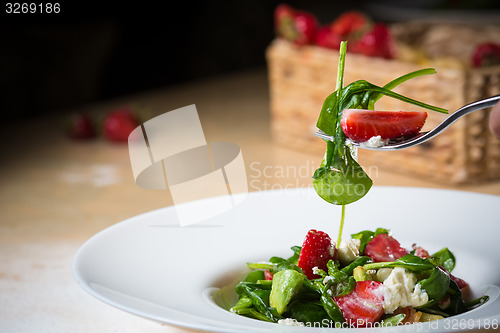 Image of Fresh Salad with strawberries, goat cheese and shrimps