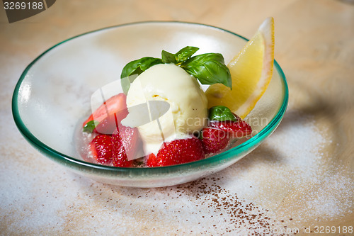 Image of Ice cream with fresh strawberries