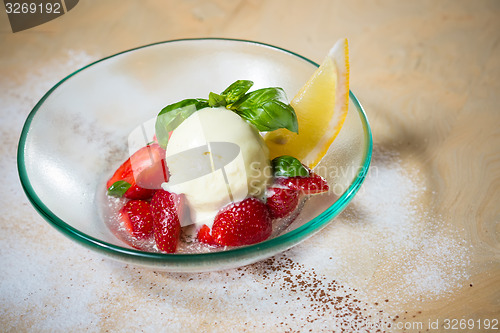 Image of Ice cream with fresh strawberries