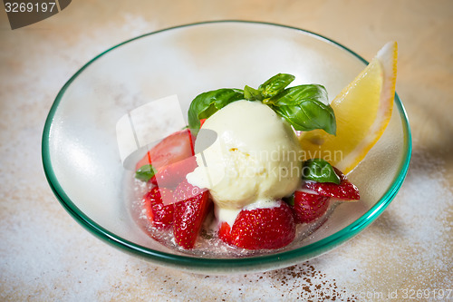 Image of Ice cream with fresh strawberries