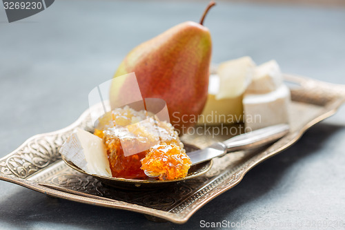 Image of Honey, pear and brie cheese.