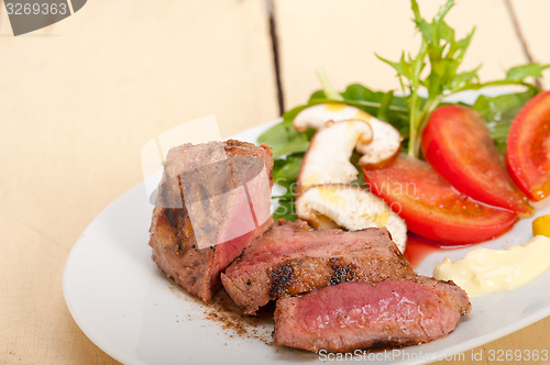 Image of beef filet mignon grilled with vegetables
