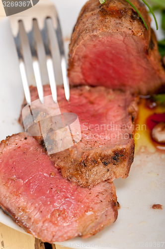 Image of beef filet mignon grilled with vegetables