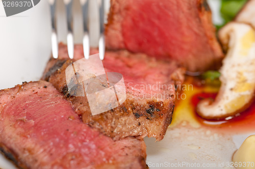 Image of beef filet mignon grilled with vegetables