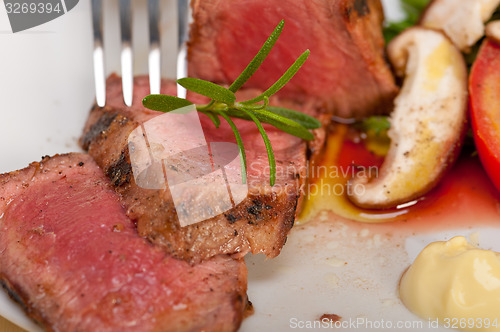 Image of beef filet mignon grilled with vegetables