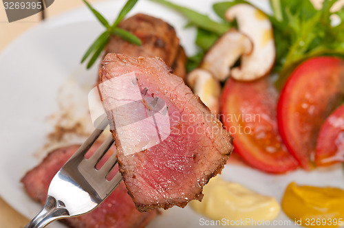 Image of beef filet mignon grilled with vegetables