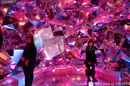 Image of Tourists enjoy Light Origami at Vivid Sydney