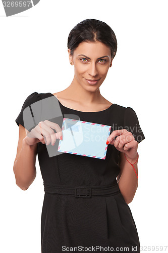 Image of Smiling business woman showing envelope