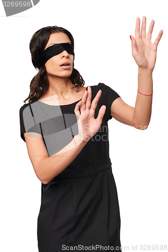 Image of Businesswoman in blindfold