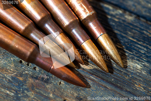 Image of Still life with several rifle cartridges