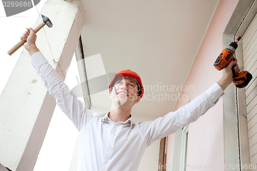 Image of joyful repairman