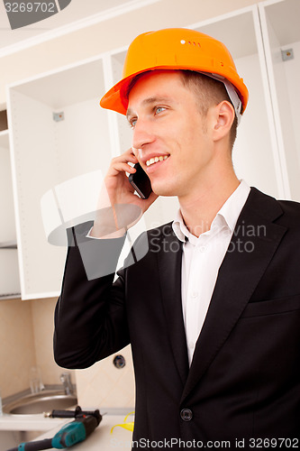 Image of engineer talking on the phone