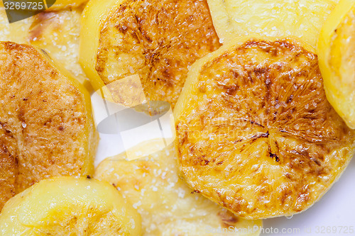 Image of slices of baked potatoes