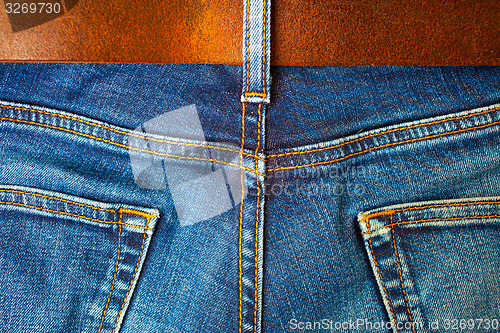 Image of Aged jeans, back view