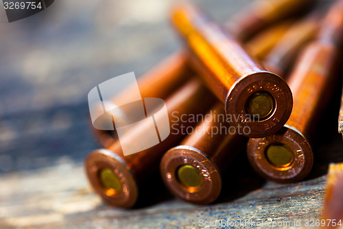 Image of Still life with five rifle cartridges