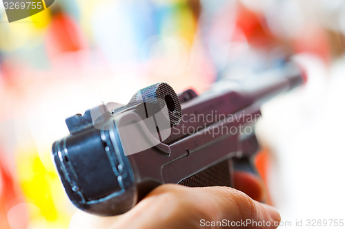 Image of Parabellum automatic pistol in a hand